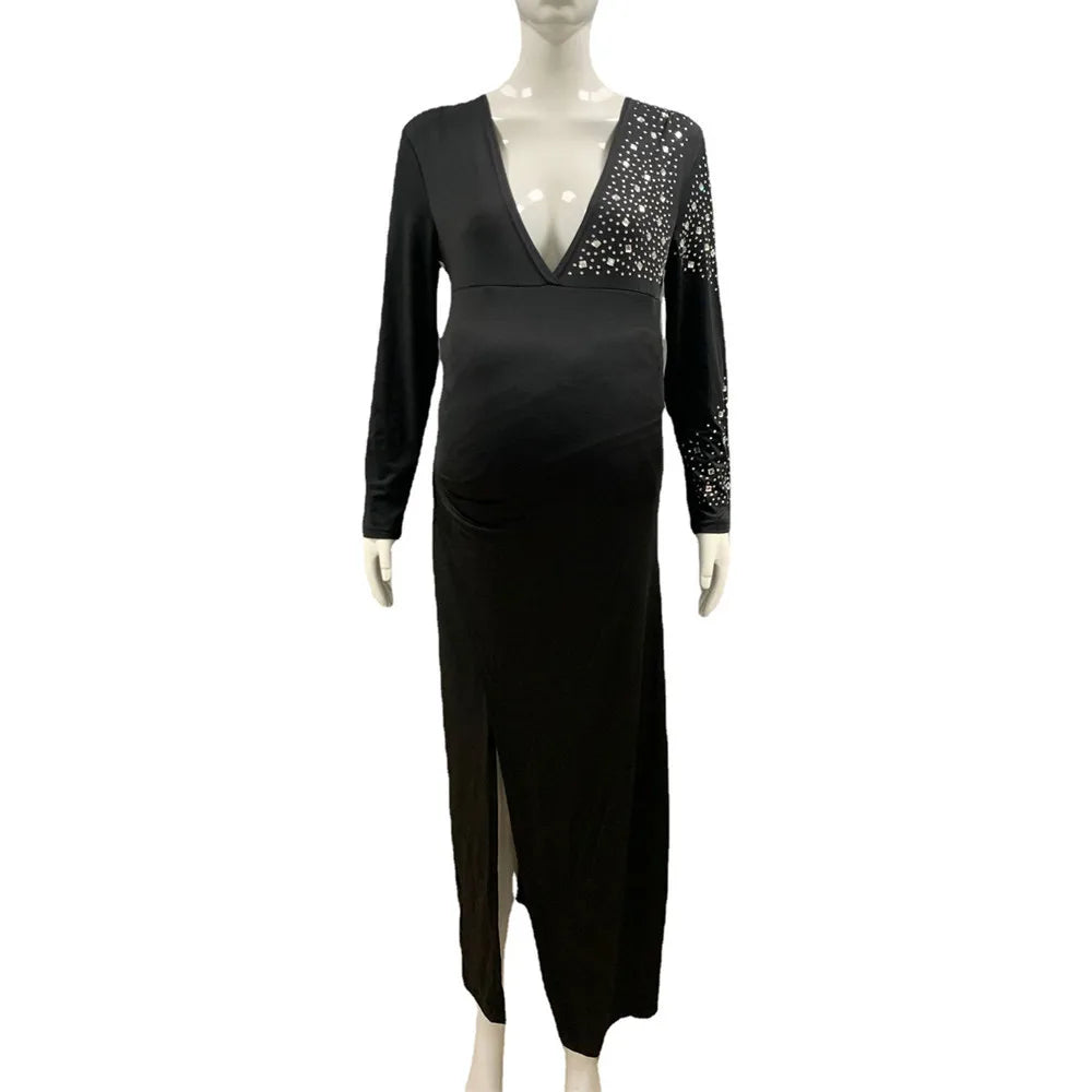 Elegant black summer maternity dress with V-neck and full sleeves, perfect for stylish party photography.