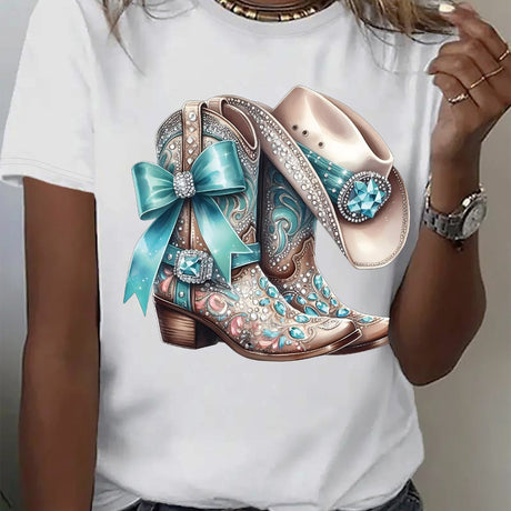 Stylish white t-shirt featuring a vibrant cowboy boots design with teal details and embellishments.