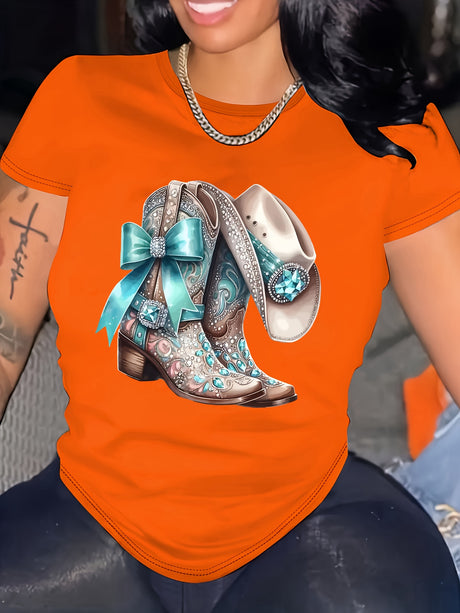 Stylish orange t-shirt featuring decorative cowboy boots with a bow and bling, perfect for casual wear.