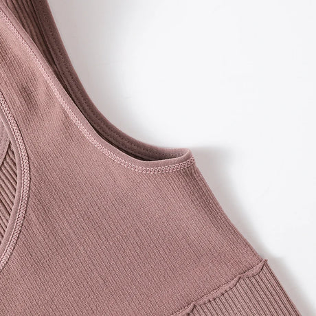 Close-up of the seamless ribbed neckline of the RibSculpt™ camisole in soft mauve color.
