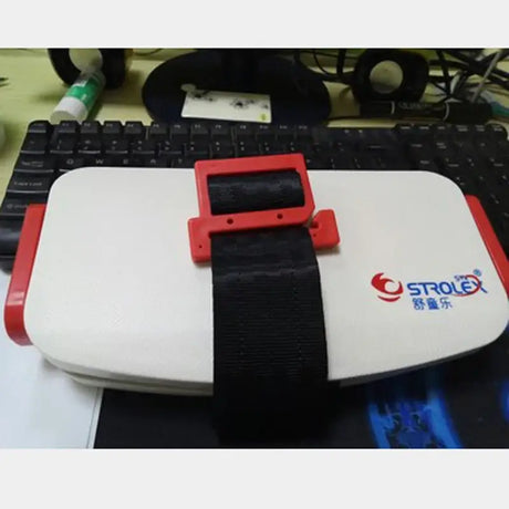 Minifold Portable Baby Car Seat Safety system with red buckle on a white base, suitable for children aged 3-6 years.