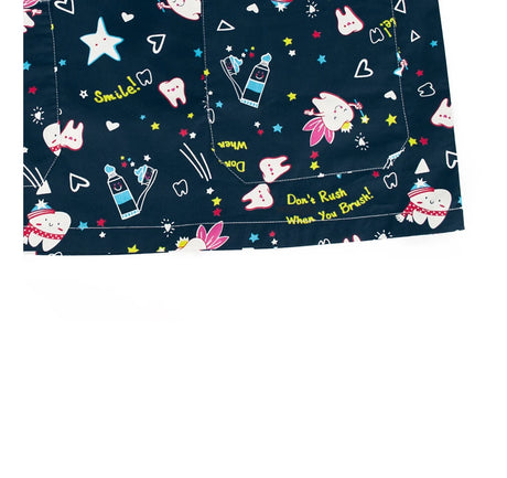 Cartoon print scrub tops featuring colorful dental-themed designs, ideal for medical use, available in multiple sizes.