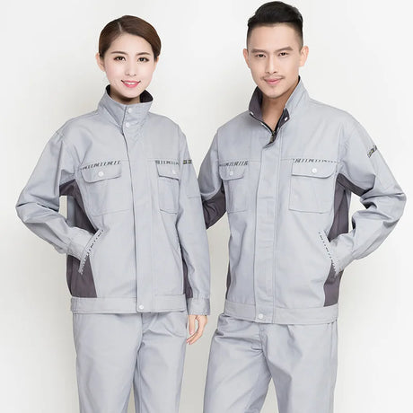 Unisex men and women in durable grey work clothing set, including jackets and trousers, ideal for workshop and utility use.