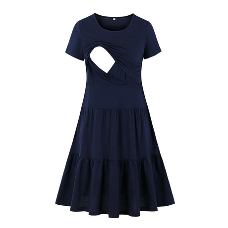 Navy blue sleeveless nursing dress with a cut-out design and tiered skirt, ideal for summer maternity wear.