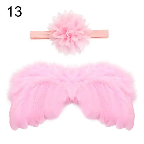Cute pink newborn angel feather wings with matching rose flower headband for baby girls.