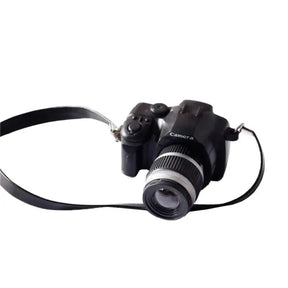 Black mini camera for 1/12 dollhouse, perfect for baby photography props and gifts. Plastic and electronics material.