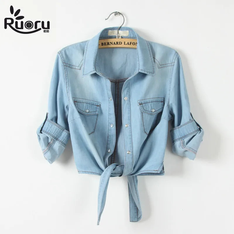 DenimDrape™ short sleeve kimono shirt in light blue, cropped style with buttoned pockets and tied front, perfect for juniors.