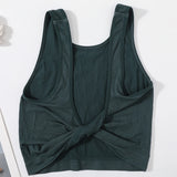 DeepVibe™ deep V ribbed crop top in dark green, seamless design perfect for streetwear and casual styling.