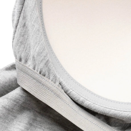 Close-up of the built-in shelf bra of ShapeEase™ camisole in gray fabric, showcasing adjustable straps and soft material.