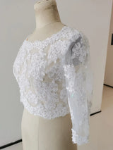 Elegant Crystal Lace Wedding Bolero with 3/4 sleeves, showcasing intricate embroidered details and soft white fabric.