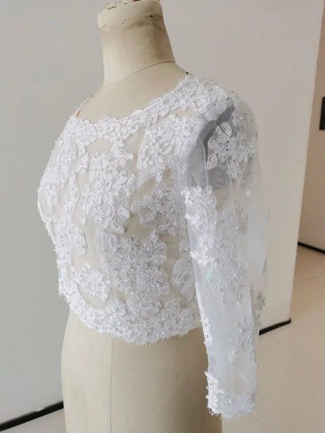 Elegant crystal beaded wedding jacket with 3/4 sleeves, featuring intricate floral appliqué detailing.