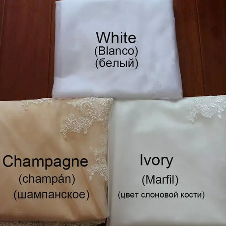 Swatches of fabrics in White, Champagne, and Ivory with lace details and multilingual labels.