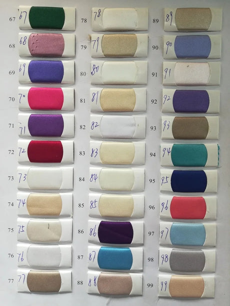 Color swatches displaying a variety of fabric hues, including greens, pinks, purples, and neutrals for design selection.