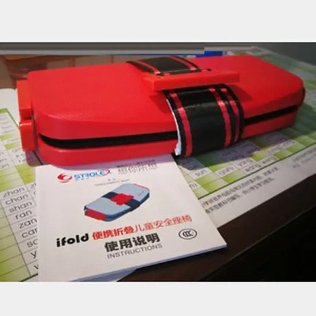 Minifold Portable Baby Car Seat Safety in red, compact design with instructions manual beside it, ideal for ages 1-6.