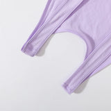 Close-up of the ribbed straps of a lavender seamless crop top, highlighting its soft knit material and design.