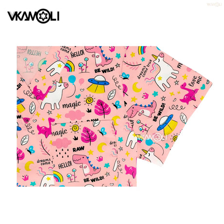 Colorful cartoon print scrub tops featuring unicorns and dinosaurs, perfect for medical professionals. Available in various sizes.