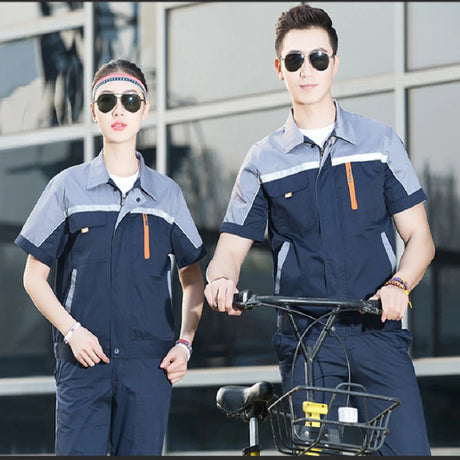 Unisex summer working uniforms featuring short-sleeve coveralls in dark blue for mechanics and electricians.