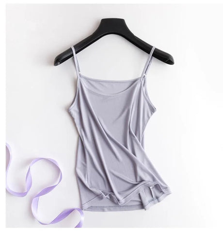 Lightweight lavender halter silk cami with solid straps, perfect for summer wear, hanging on a black hanger.