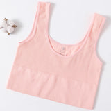 Pink seamless ribbed camisole, women's fitness-ready tank top, soft nylon-spandex blend, perfect for summer wear.