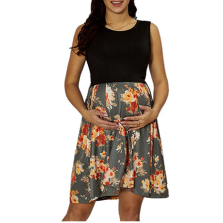 Sleeveless contrast stitch nursing dress featuring floral pattern, perfect for maternity wear in summer.