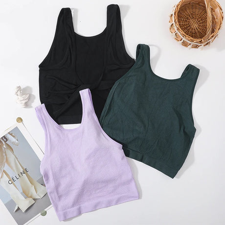 DeepVibe™ seamless ribbed crop tops in black, green, and purple for women, perfect for streetwear and casual styles.