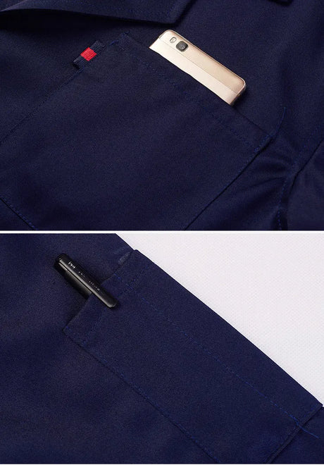 Close-up of Workshop Coverall featuring a pocket for a smartphone and a pen, showcasing utility and practicality.