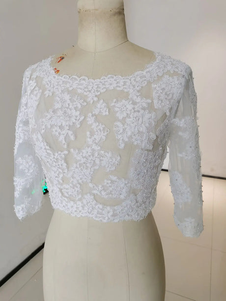 Crystal Lace Wedding Bolero with 3/4 sleeves, featuring intricate appliqué detailing and a stylish, sheer design.