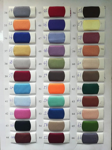 Color swatch chart displaying various fabric colors and samples for design selection.