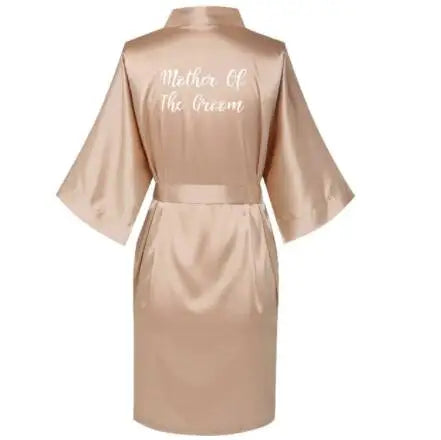 Rose gold satin robe for mother of the bride, featuring elegant text on back, stylish and comfortable.