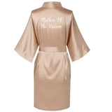 Rose gold satin robe for the mother of the groom, featuring stylish short sleeves and waist tie.
