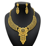 Luxury Indian bridal jewelry set featuring 24K gold plated necklace and matching earrings, perfect for weddings.