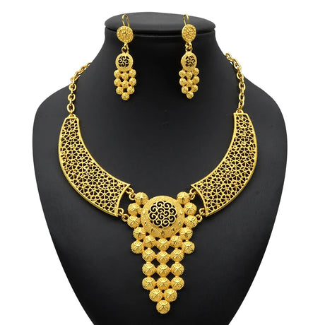 Luxury Indian bridal jewelry set featuring 24K gold plated necklace and matching earrings, perfect for weddings.