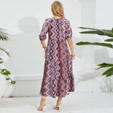 Elegant beach maternity dress with geometric patterns, ideal for summer photoshoots, showing the back view.