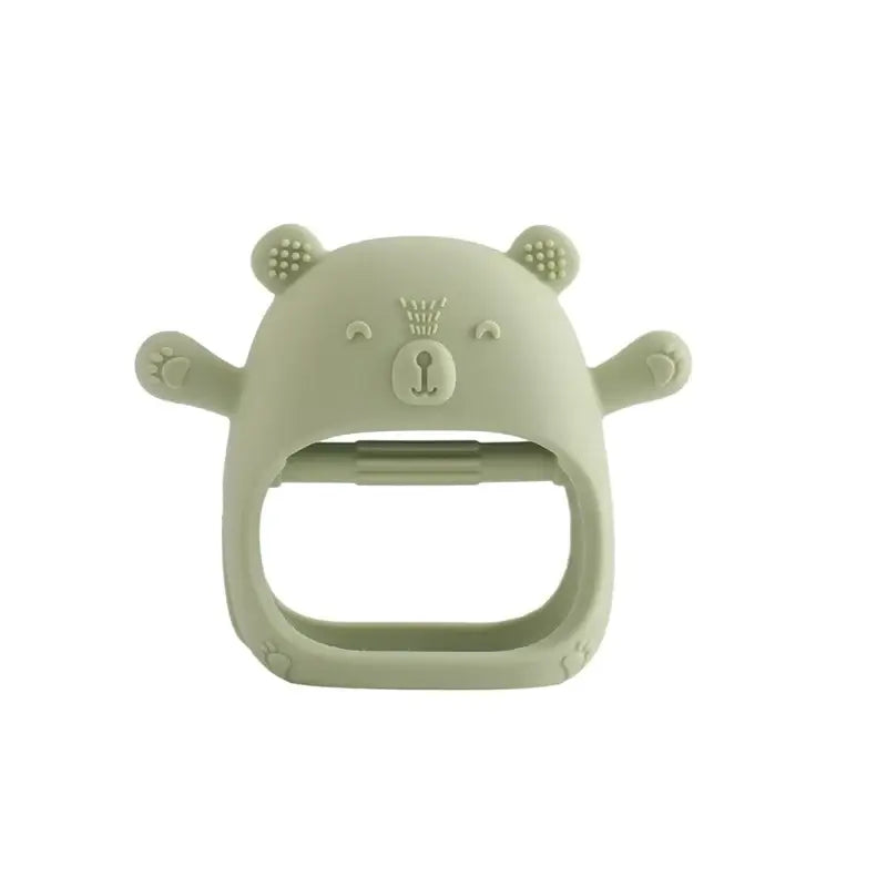 Soft green baby teether glove shaped like a bear, made from safe, non-toxic silicone for soothing tooth pain.
