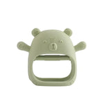 Soft green baby teether glove shaped like a bear, made from safe, non-toxic silicone for soothing tooth pain.