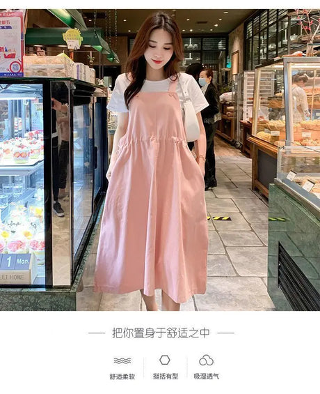 Korean loose fit maternity dress in pink, perfect for holiday photography and casual outings.