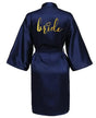 Navy satin robe for brides with gold 'bride' lettering, perfect for wedding day preparations.