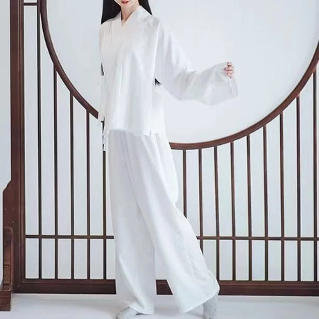 Person wearing a Ming Dynasty Hanfu inner robe costume in white, showcasing traditional Chinese fashion.