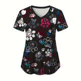 Cartoon animal scrubs for women featuring colorful paw prints and cartoon pets, perfect for vet or medical use.