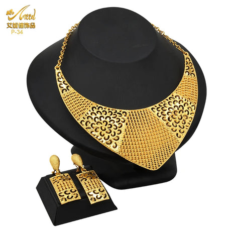 Luxury Indian bridal jewelry necklace and earrings set in 24K gold plating, perfect for weddings.