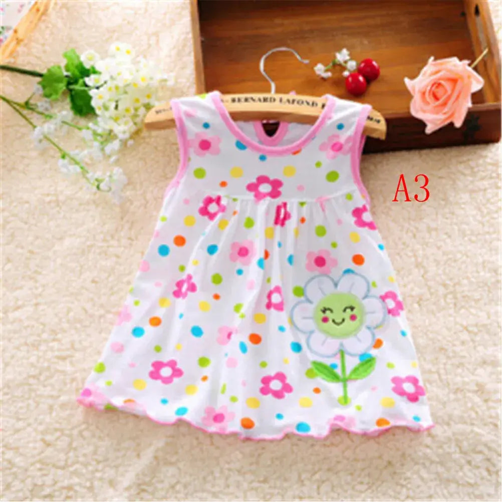 Newborn cotton sleeveless dress with floral and polka dot pattern for baby girls, ideal for summer.
