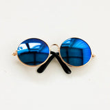 Colorful round sunglasses for newborn photography accessories, ideal for creating charming photo shoots.