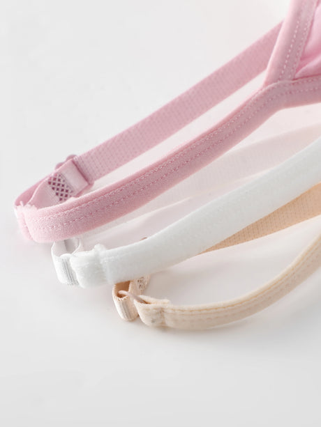 Adjustable bra straps in pink, white, and beige colors, demonstrating comfort and versatility.