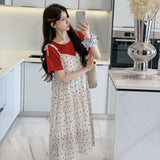 Floral two-piece maternity skirt in contrasting colors, perfect for summer, featuring an A-line silhouette and short sleeves.