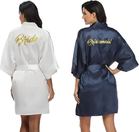 6-piece satin bridal robe set featuring a white 'Bride' robe and a navy 'Bridesmaid' robe, perfect for wedding celebrations.