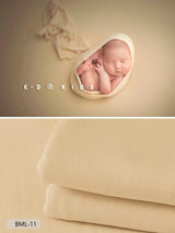 Newborn soft wrap blanket in neutral color, ideal for newborn photography, safe and comfortable fabric.
