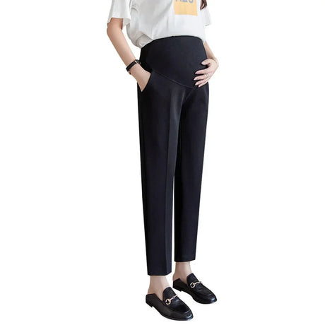 Formal black maternity pants for women, featuring a comfortable fit and pockets, ideal for summer work wear.