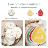 Newborn milestone cards featuring leaf designs for monthly tracking, showcasing two options in a double-sided format.