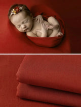 Newborn soft wrap blanket in red, perfect for photography and comfortable for babies, available in 55 colors.