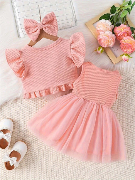 Newborn girls dress set with short sleeves, ruffled top, and tulle skirt in pink, perfect for summer occasions.